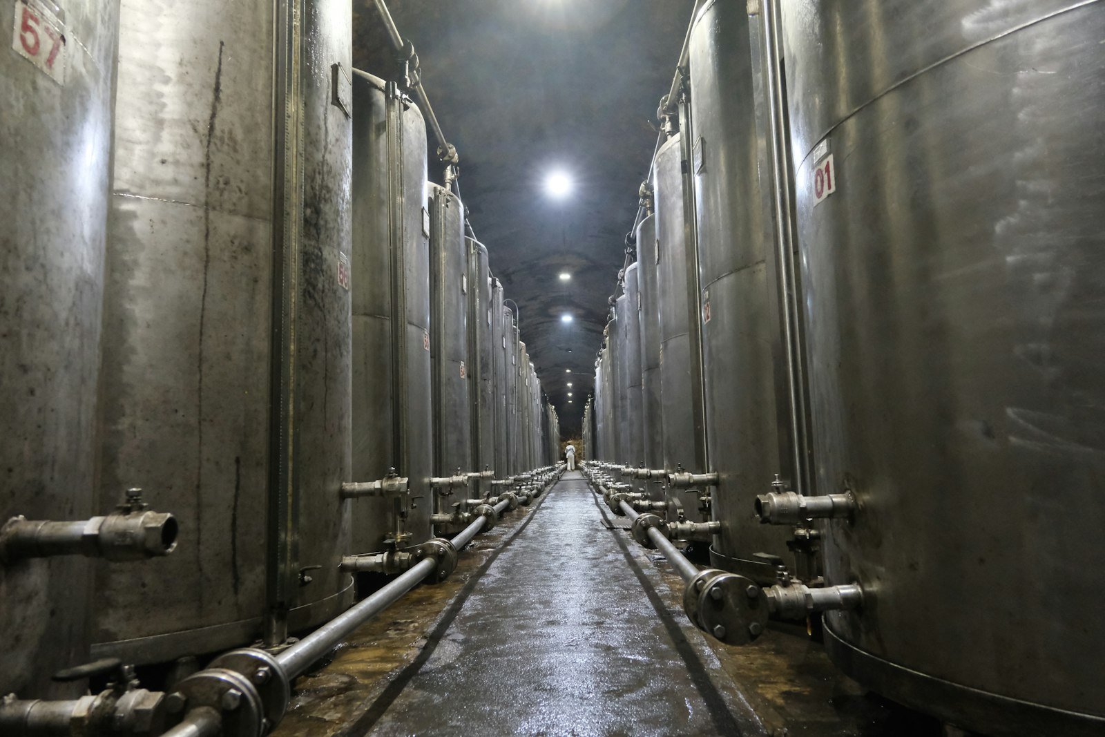 Corridor between stainless tanks