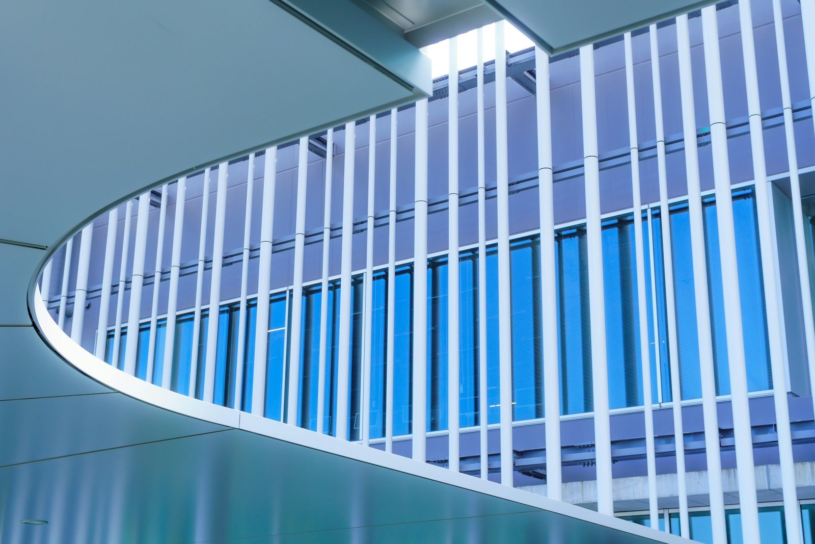 Curved glass corridor in an office building