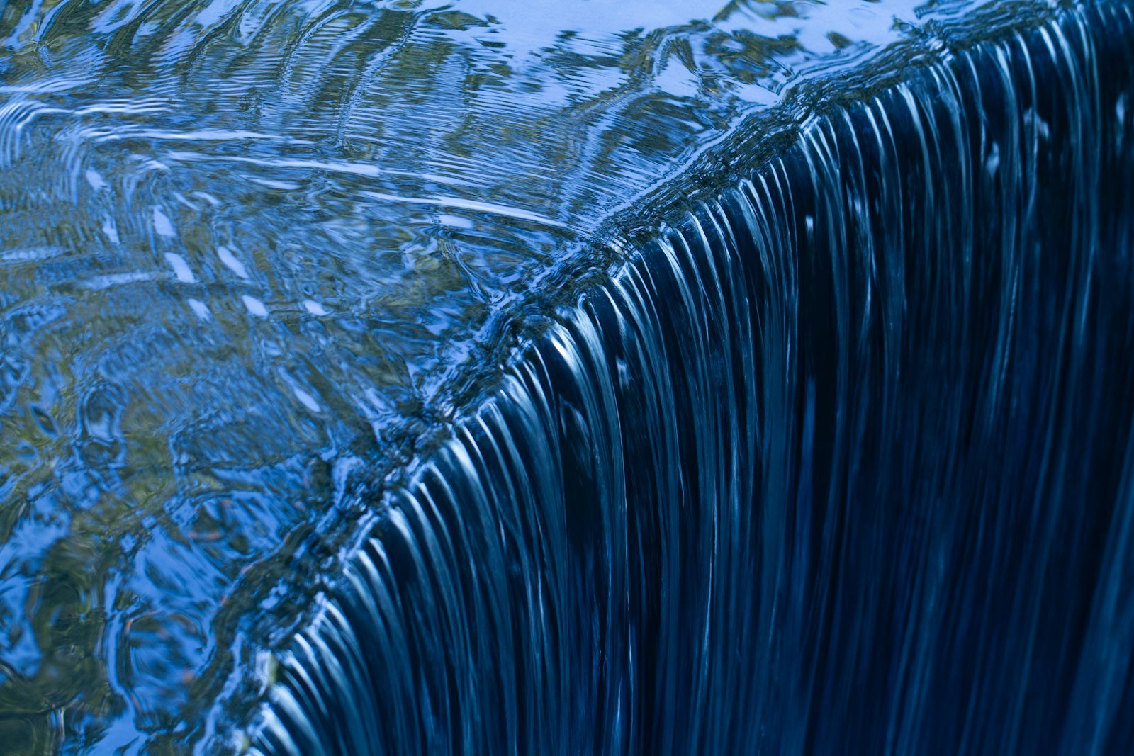 Water pouring over a spillway