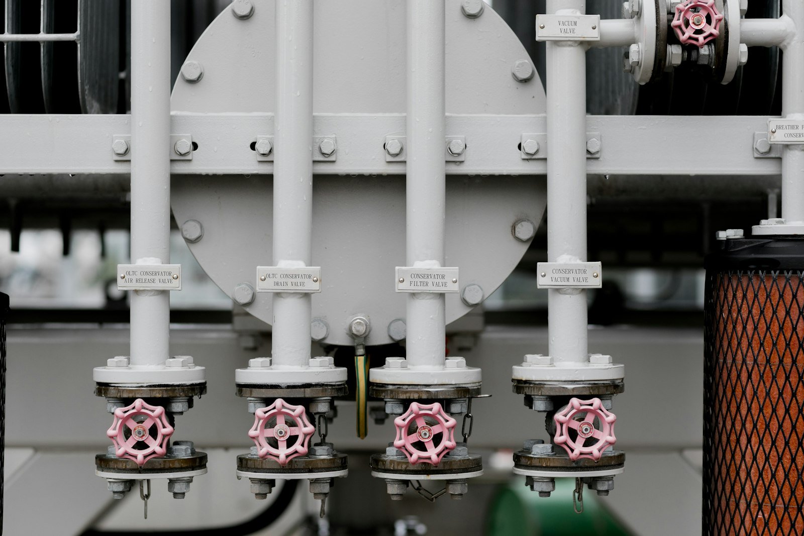 Pipes with red valve wheels