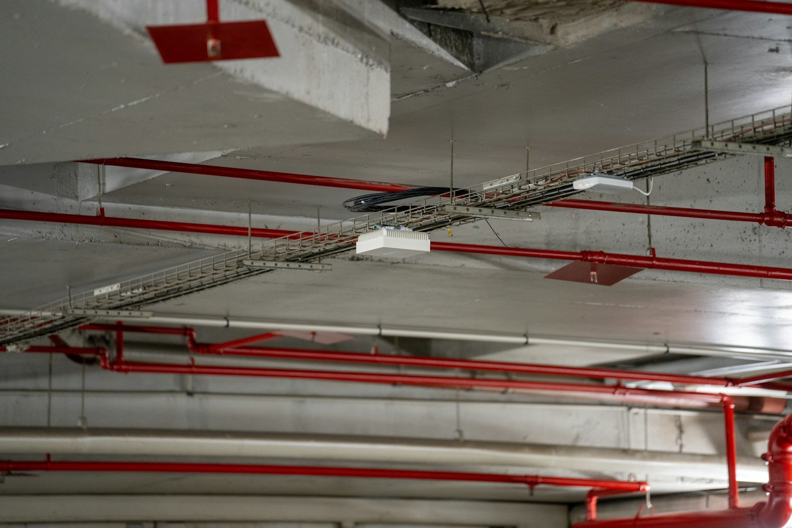 Exposed ceiling with sprinkler pipes