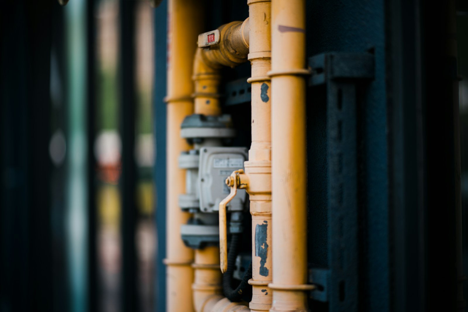 Water meter on yellow pipework